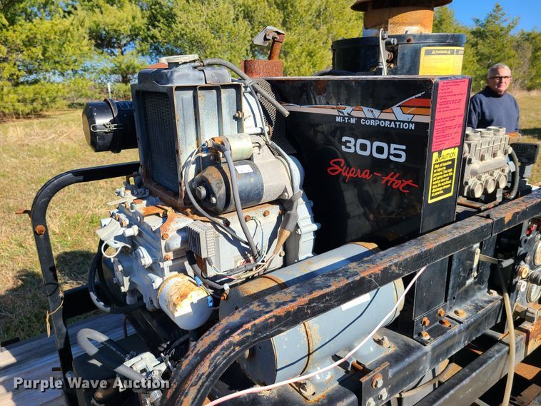 image for item HM9760 1998 Kodiak utility trailer with steam cleaner