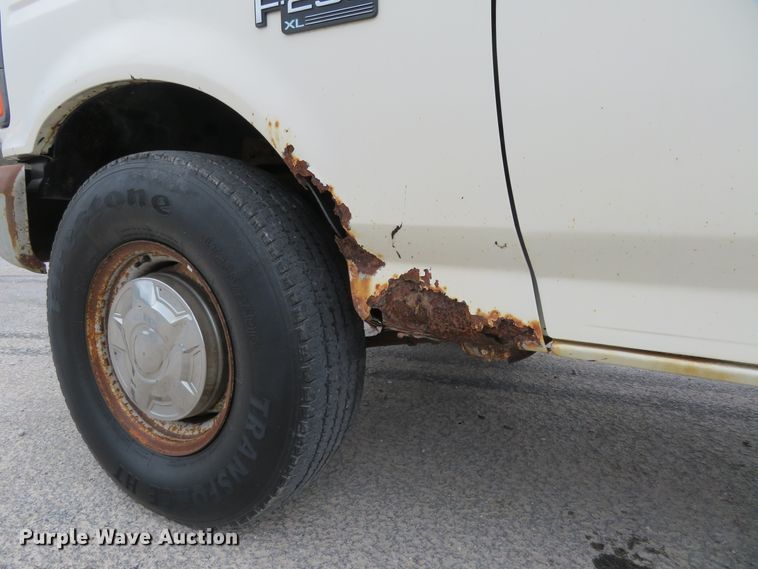 image for item HV9744 1995 Ford F250 XL  utility bed pickup truck