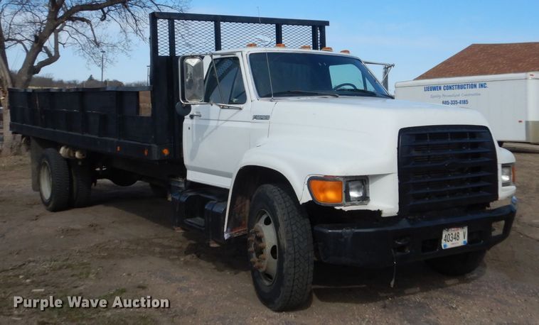 image for item HE9582 1999 Ford F800  dump flatbed truck