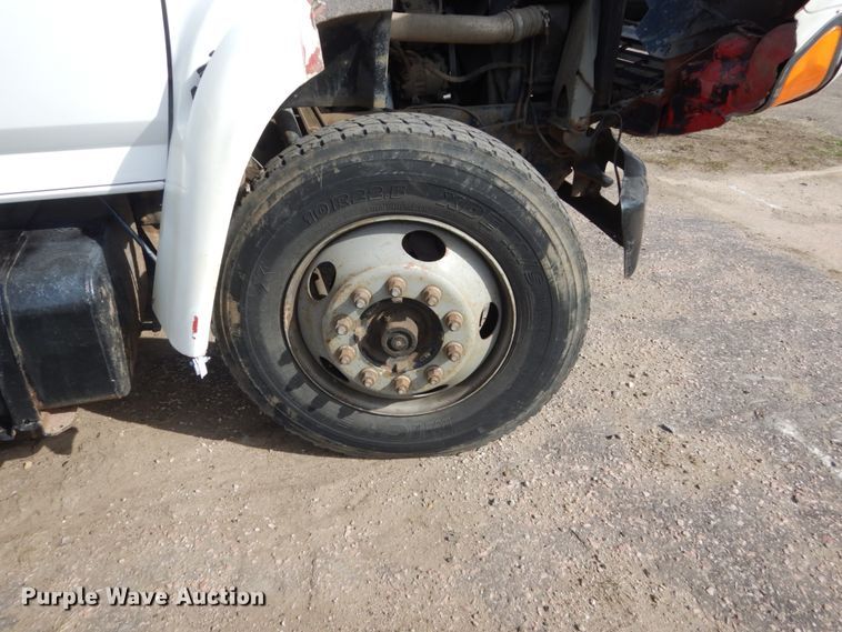 image for item HE9582 1999 Ford F800  dump flatbed truck