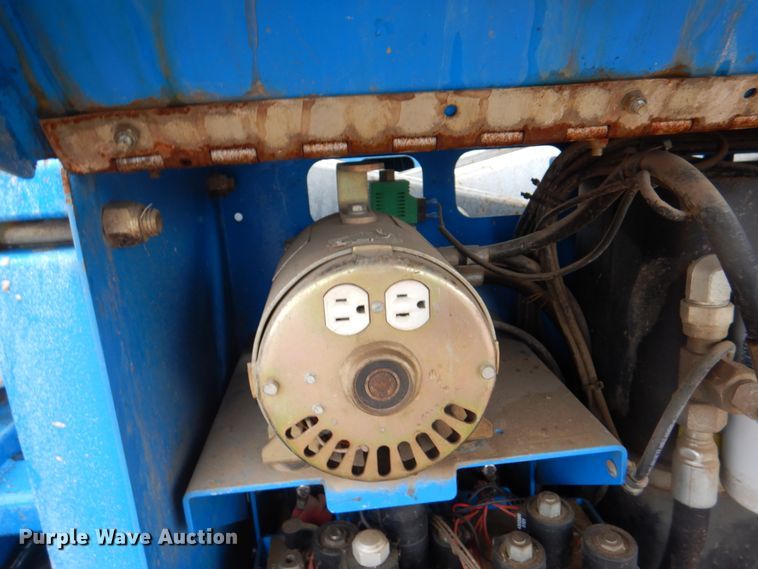 image for item II9923 Genie GS3268RT  scissor lift