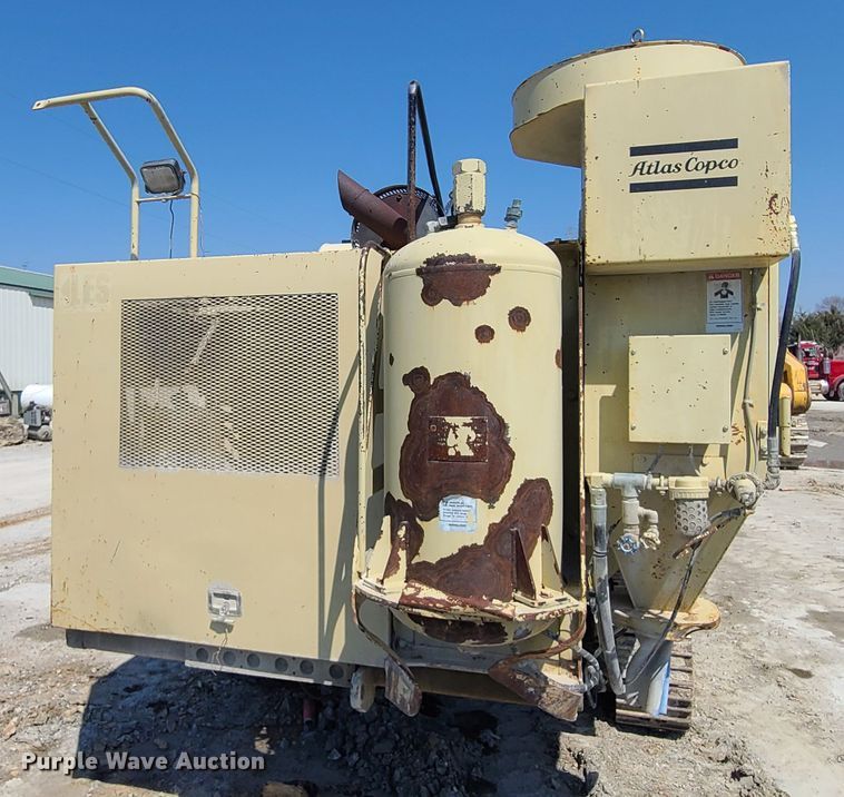 image for item IQ9099 Ingersoll Rand ECM-585  rock pilot drill