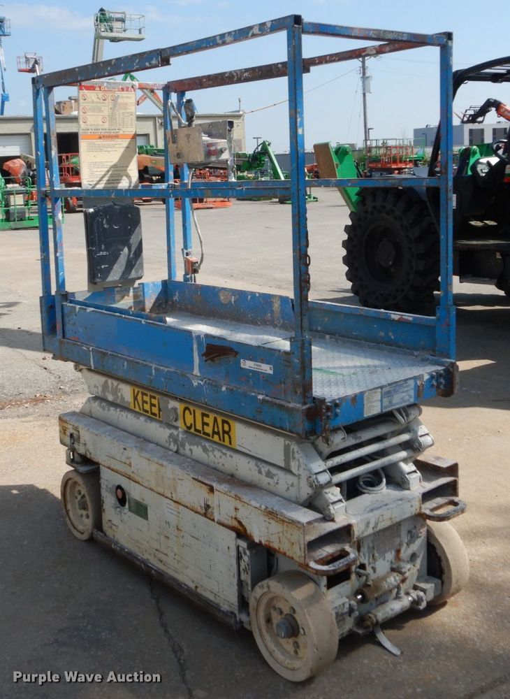 image for item IY9569 2001 Sky Jack SJ III 3015  scissor lift