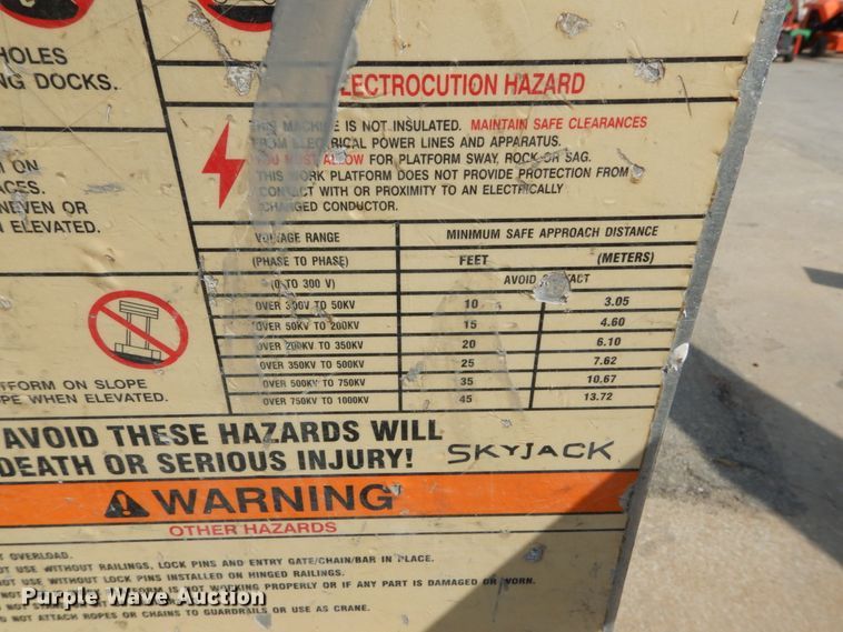 image for item IY9569 2001 Sky Jack SJ III 3015  scissor lift