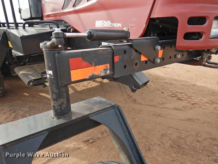 image for item DJ8381 2013 MacDon M205  windrower