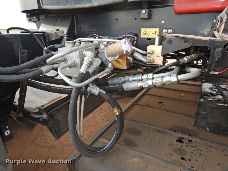 image for item DJ8381 2013 MacDon M205  windrower