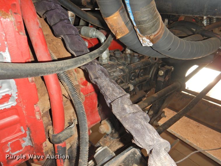 image for item DJ8381 2013 MacDon M205  windrower