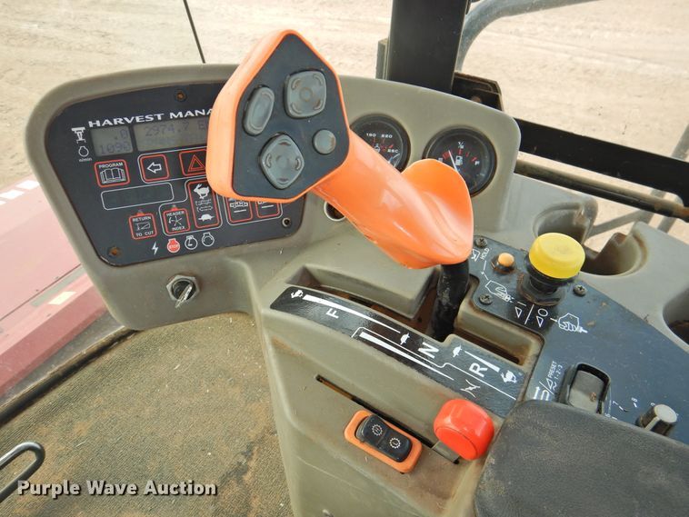 image for item DJ8381 2013 MacDon M205  windrower