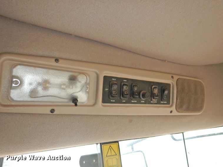 image for item DJ8381 2013 MacDon M205  windrower