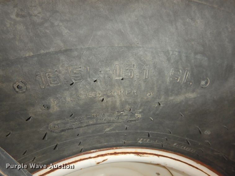 image for item DJ8381 2013 MacDon M205  windrower