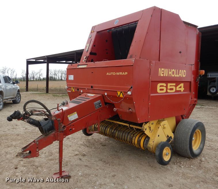 image for item DL2790 1998 New Holland 654  round baler