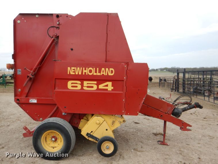 image for item DL2790 1998 New Holland 654  round baler