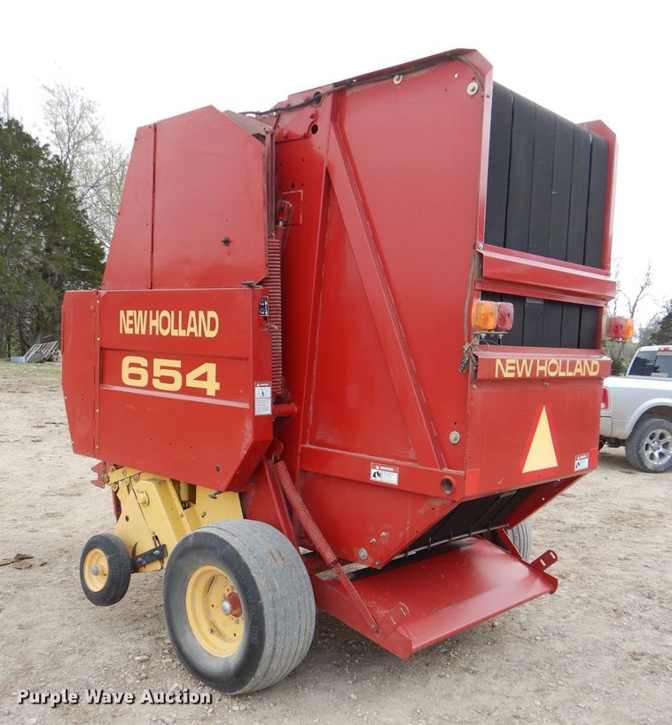 image for item DL2790 1998 New Holland 654  round baler