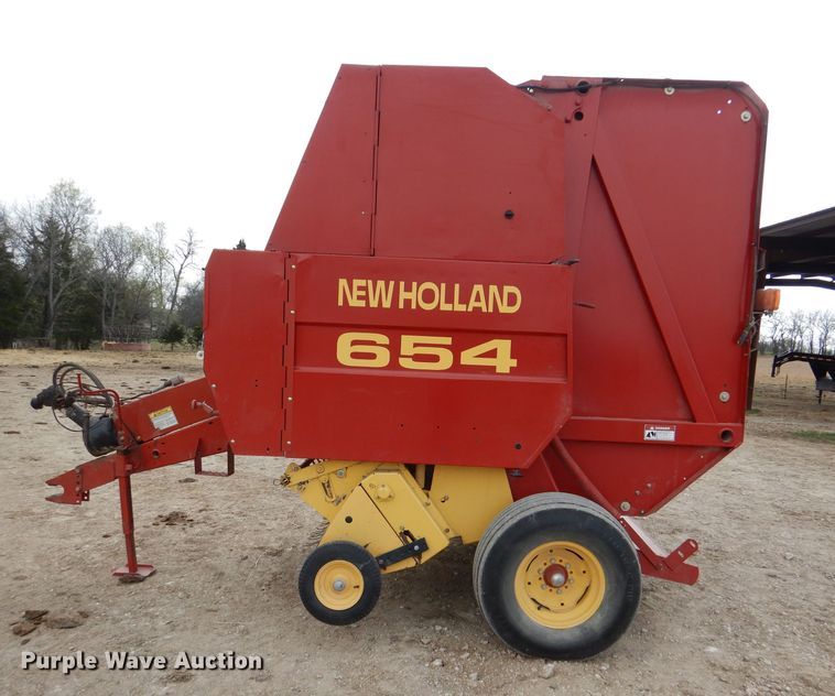 image for item DL2790 1998 New Holland 654  round baler