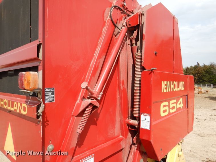 image for item DL2790 1998 New Holland 654  round baler