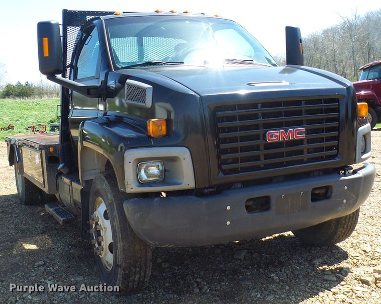 image for item DL0957 2005 GMC C7500  flatbed truck