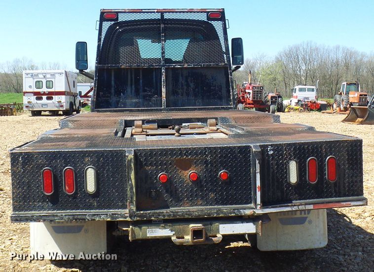 image for item DL0957 2005 GMC C7500  flatbed truck