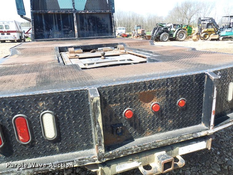 image for item DL0957 2005 GMC C7500  flatbed truck