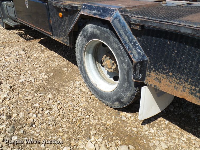 image for item DL0957 2005 GMC C7500  flatbed truck