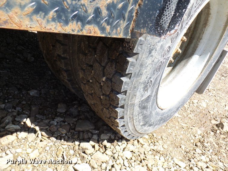 image for item DL0957 2005 GMC C7500  flatbed truck