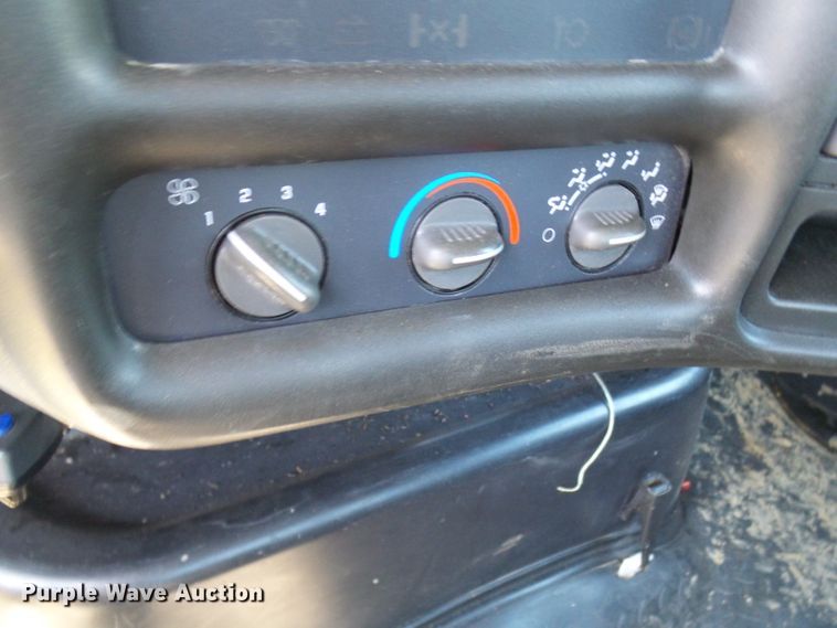 image for item DL0957 2005 GMC C7500  flatbed truck