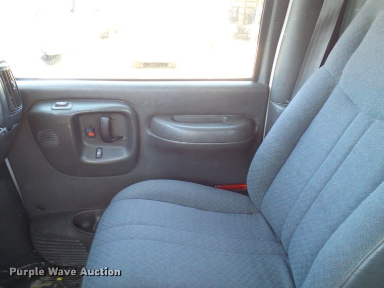 image for item DL0957 2005 GMC C7500  flatbed truck