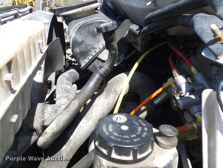 image for item DL0957 2005 GMC C7500  flatbed truck