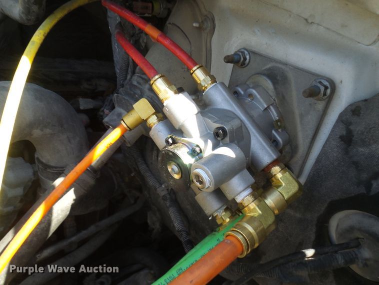 image for item DL0957 2005 GMC C7500  flatbed truck