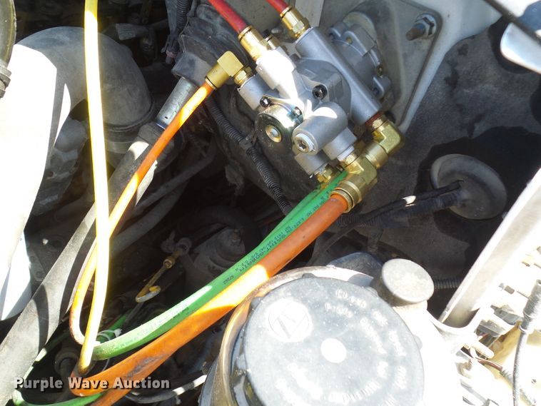 image for item DL0957 2005 GMC C7500  flatbed truck