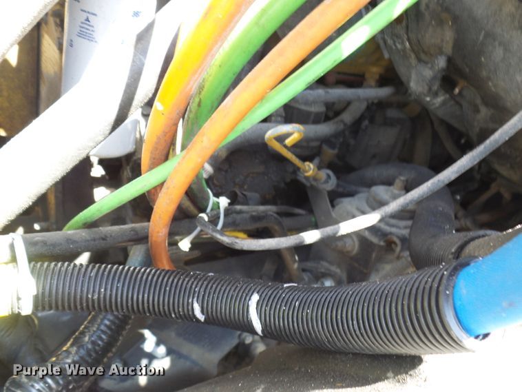 image for item DL0957 2005 GMC C7500  flatbed truck