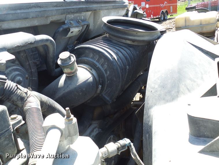 image for item DL0957 2005 GMC C7500  flatbed truck