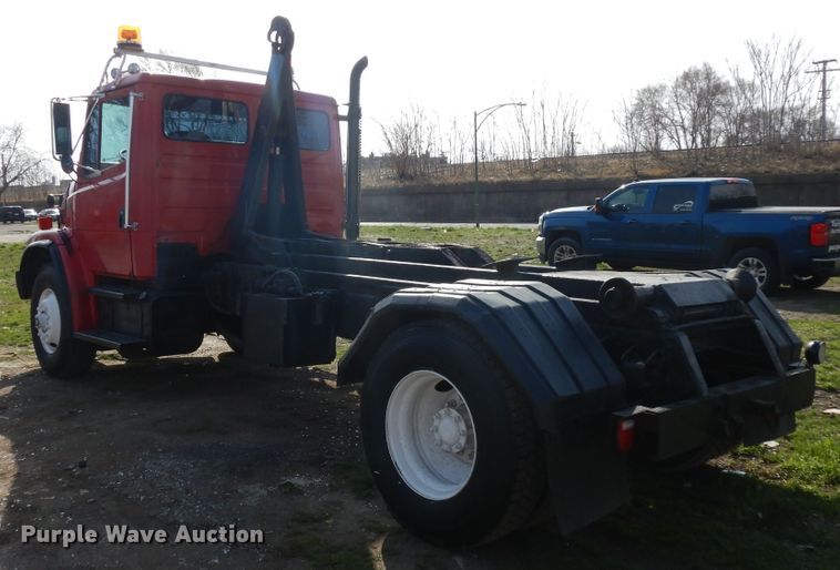 image for item IP9108 1997 Freightliner FL80  hook lift container truck