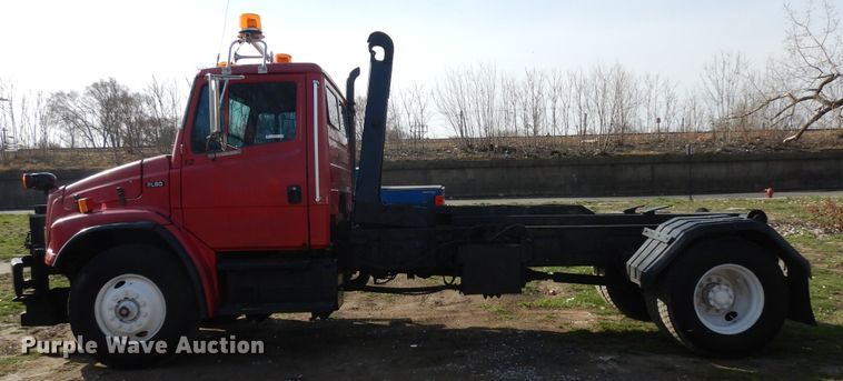 image for item IP9108 1997 Freightliner FL80  hook lift container truck