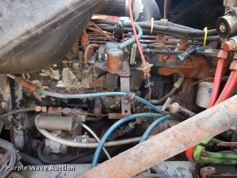 image for item IP9108 1997 Freightliner FL80  hook lift container truck