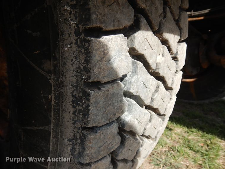 image for item IP9108 1997 Freightliner FL80  hook lift container truck