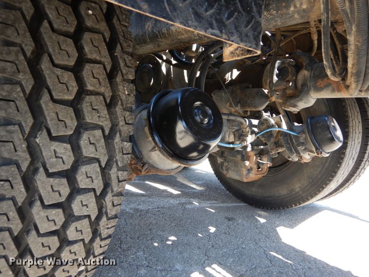 image for item IY9549 2000 Mack RD688S  roll-off container truck