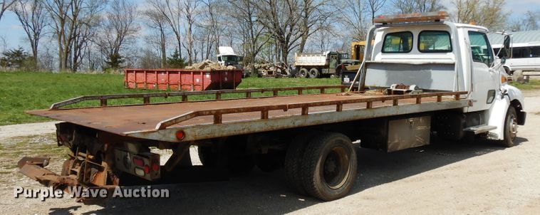 image for item DF6776 2001 Sterling Acterra  rollback truck