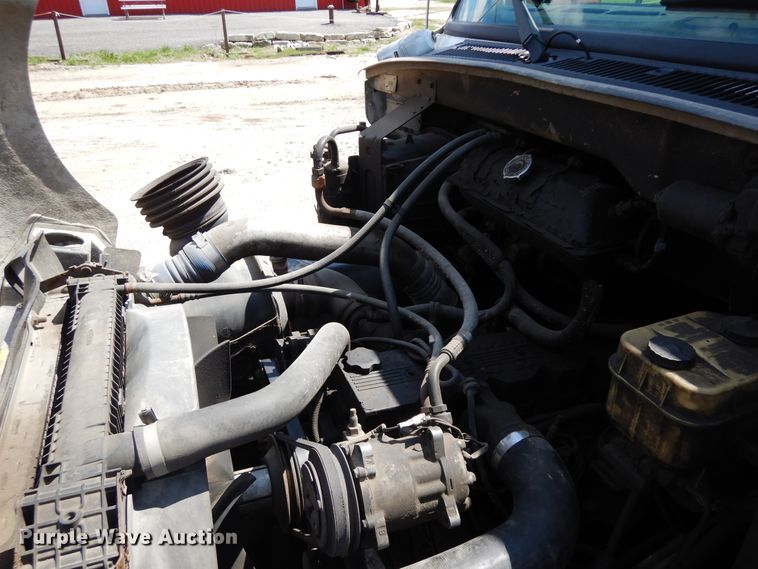 image for item DF6776 2001 Sterling Acterra  rollback truck