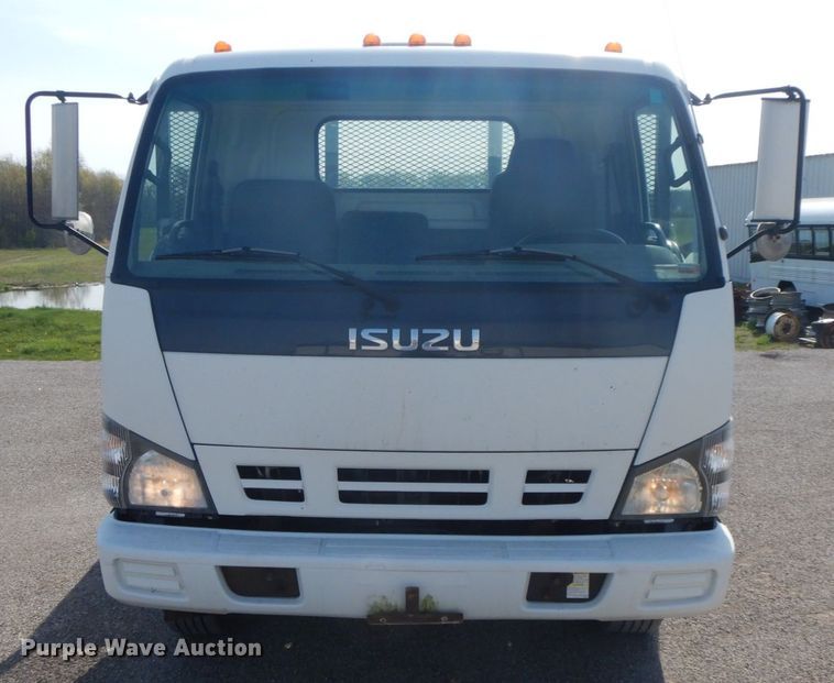 image for item IX9494 2006 Isuzu NQR  flatbed truck