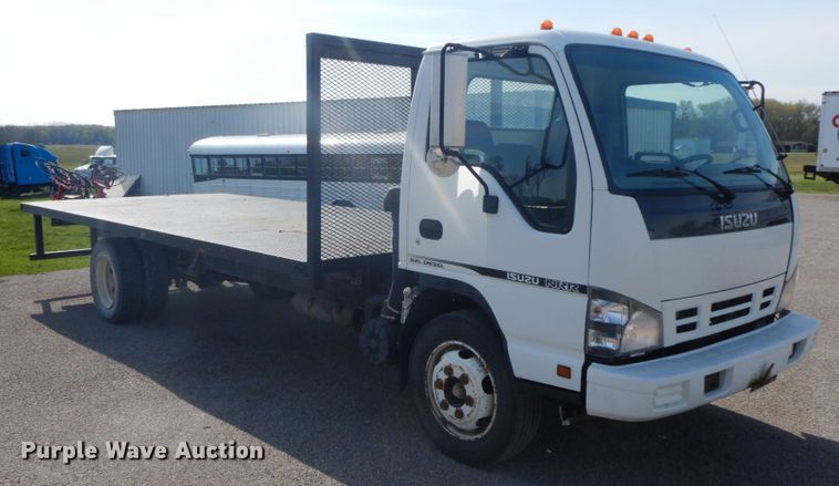 image for item IX9494 2006 Isuzu NQR  flatbed truck