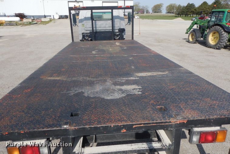 image for item IX9494 2006 Isuzu NQR  flatbed truck