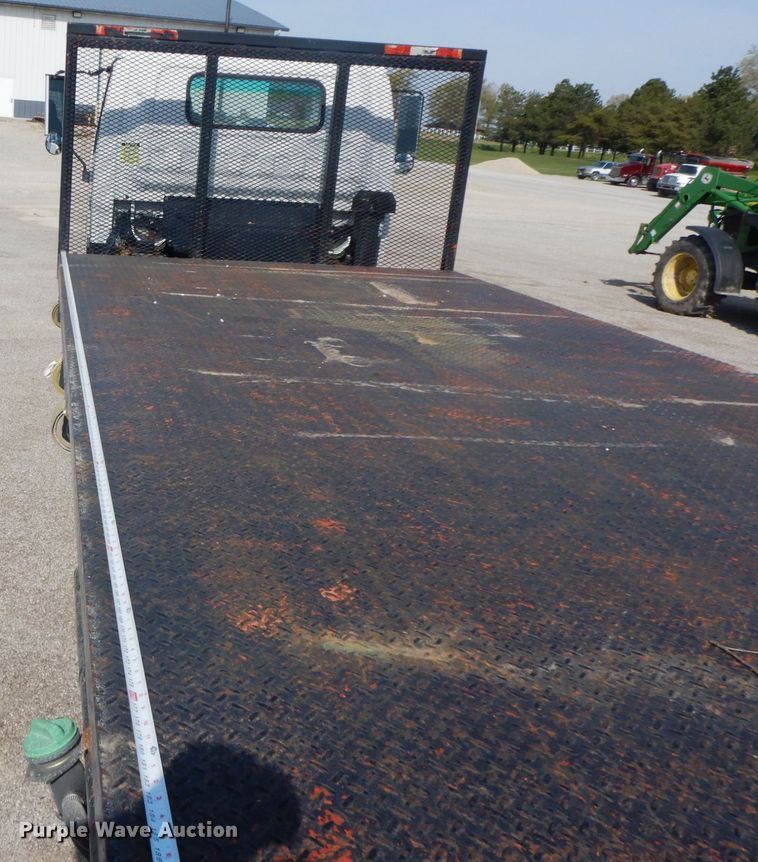 image for item IX9494 2006 Isuzu NQR  flatbed truck