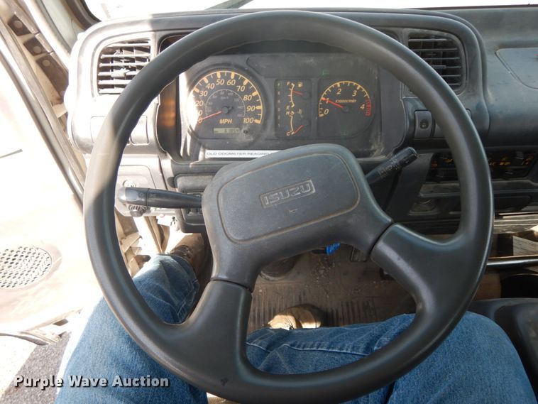 image for item IX9494 2006 Isuzu NQR  flatbed truck