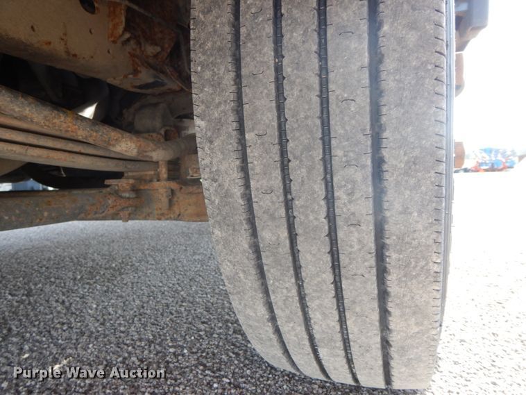 image for item IX9494 2006 Isuzu NQR  flatbed truck