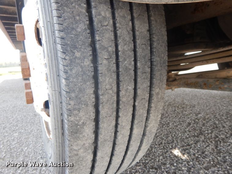 image for item IX9494 2006 Isuzu NQR  flatbed truck