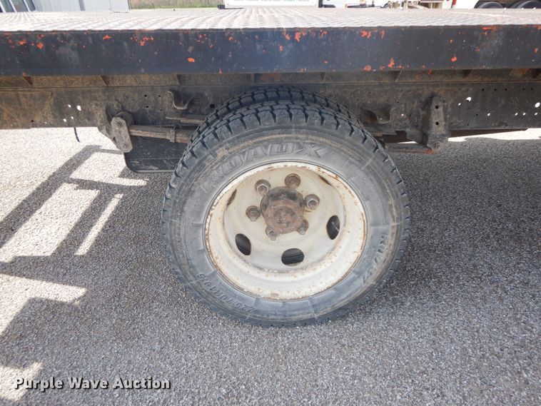 image for item IX9494 2006 Isuzu NQR  flatbed truck