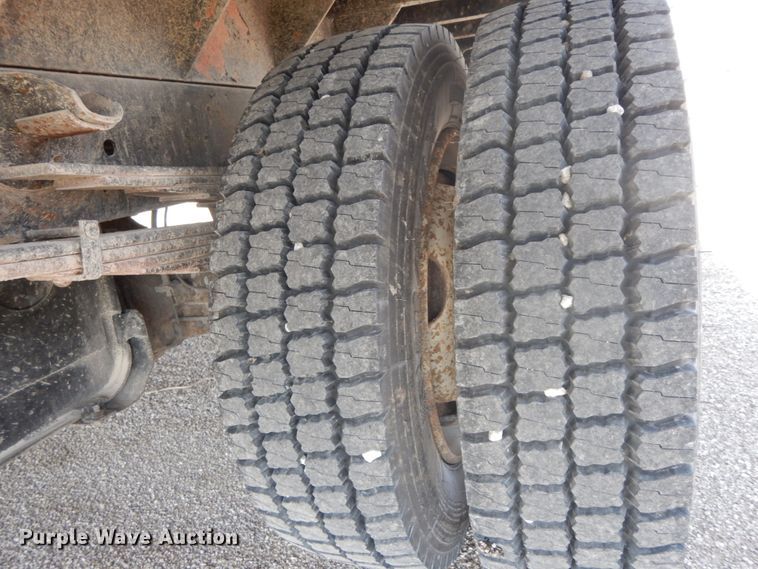 image for item IX9494 2006 Isuzu NQR  flatbed truck