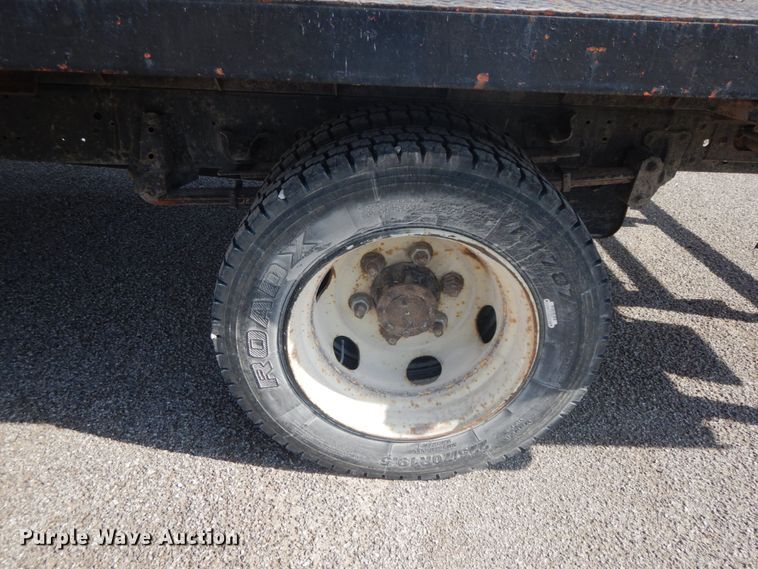 image for item IX9494 2006 Isuzu NQR  flatbed truck