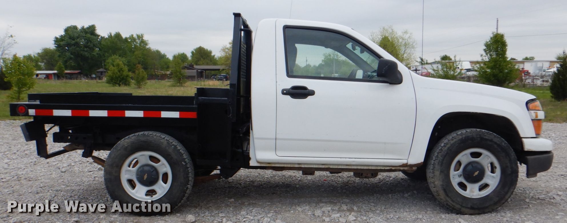 2012 Chevrolet Colorado flatbed pickup truck in Collinsville, OK Item