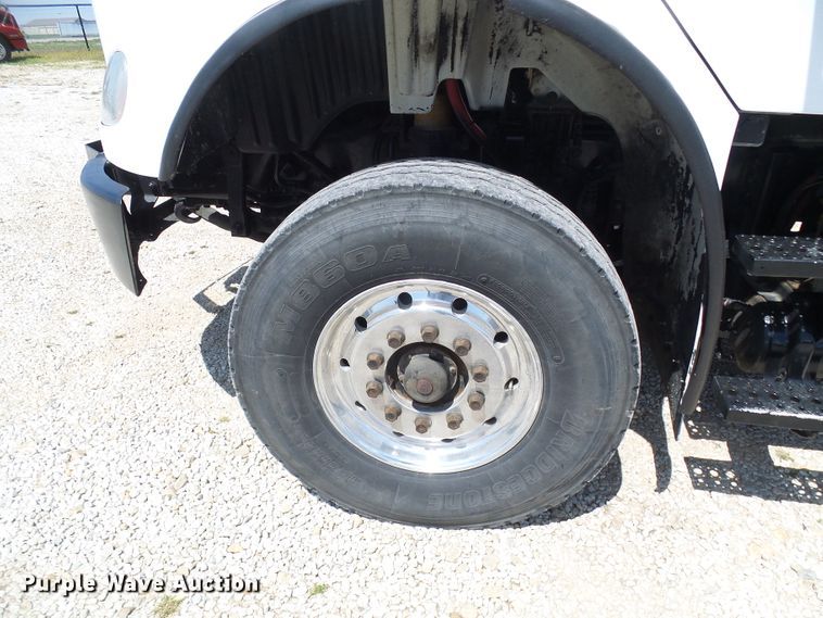 image for item DG2115 2007 Freightliner Business Class M2  roll off container truck